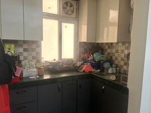 Kitchen in 1 BHK Apartment at Shree Vardhman Green Court, Sector 90 – for Rent