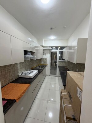 Kitchen in 2 BHK Apartment at Godrej Woods Evergreen, Sector 43 – for Rent
