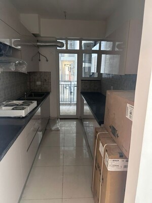 Kitchen in 2 BHK Apartment at Godrej Woods Evergreen, Sector 43 – for Rent