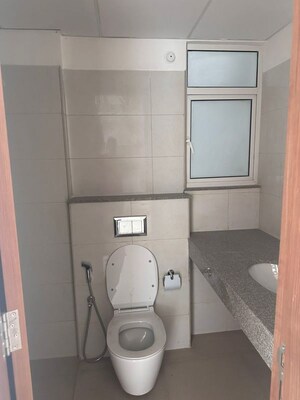Bathroom in 2 BHK Apartment at Godrej Woods Evergreen, Sector 43 – for Rent