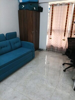 Living Room in 1 BHK Apartment at Lodha Amara, Kolshet Road – for Rent