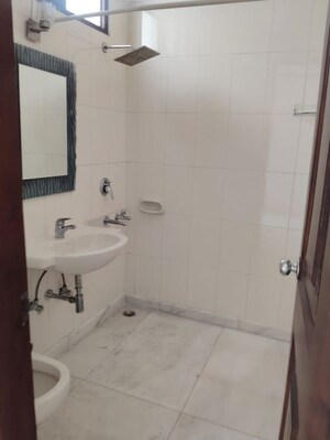Bathroom in 4 BHK Builder Floor at Safdarjung Development Area – for Rent