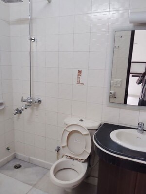 Bathroom in 4 BHK Builder Floor at Safdarjung Development Area – for Rent