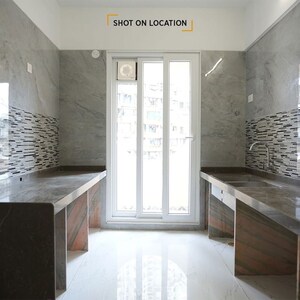 Building Lobby in 2 BHK Apartment at Tharwani Vedant Palacia, Khadakpada – for Sale
