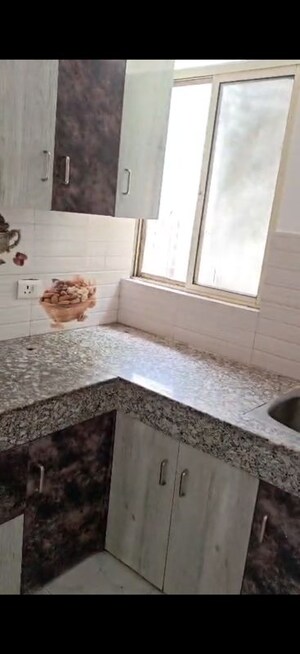 Kitchen in 2 BHK Apartment at Proview Officer City, Raj Nagar Extension – for Rent