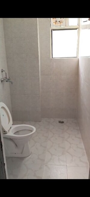 Bathroom in 2 BHK Apartment at Proview Officer City, Raj Nagar Extension – for Rent