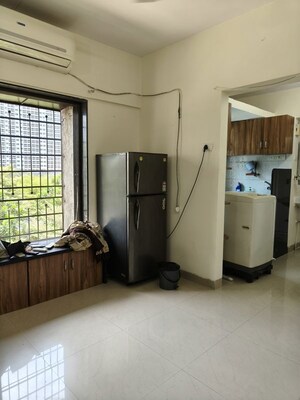 Living Room in 1 BHK Apartment at Sai Milan CHS, Worli – for Rent
