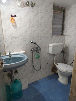 Bathroom in 2 BHK Apartment at Riddhi Garden, Malad East – for Rent