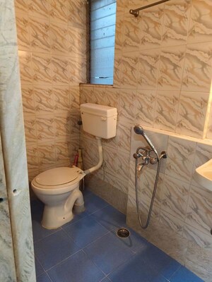 Bathroom in 2 BHK Apartment at Riddhi Garden, Malad East – for Rent