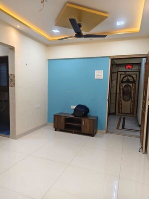 Living Room in 2 BHK Apartment at Riddhi Garden, Malad East – for Rent
