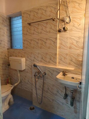 Bathroom in 2 BHK Apartment at Riddhi Garden, Malad East – for Rent