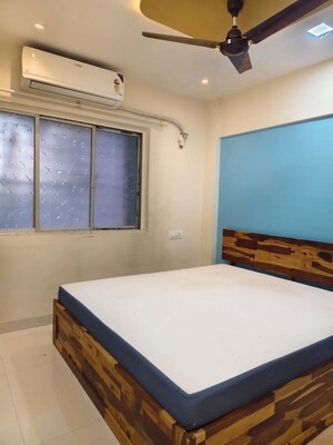 Bedroom in 2 BHK Apartment at Riddhi Garden, Malad East – for Rent