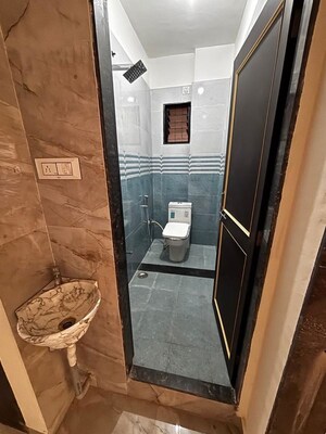 Bathroom in 1 BHK Apartment at Wadgaon Sheri – for Rent