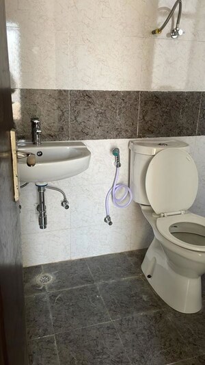 Bathroom in 3 BHK Apartment at Amrapali Silicon City, Sector 76 – for Rent