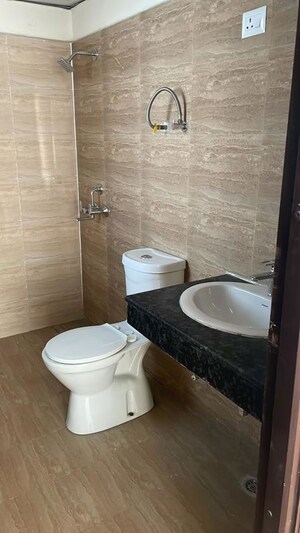 Bathroom in 3 BHK Apartment at Amrapali Silicon City, Sector 76 – for Rent