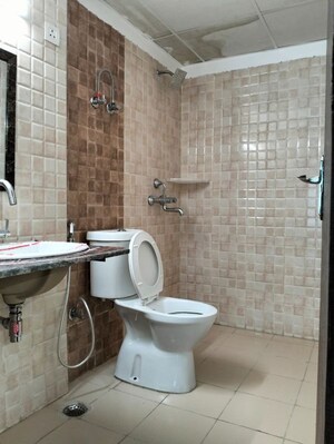 Bathroom in 3 BHK Apartment at Amrapali Silicon City, Sector 76 – for Rent