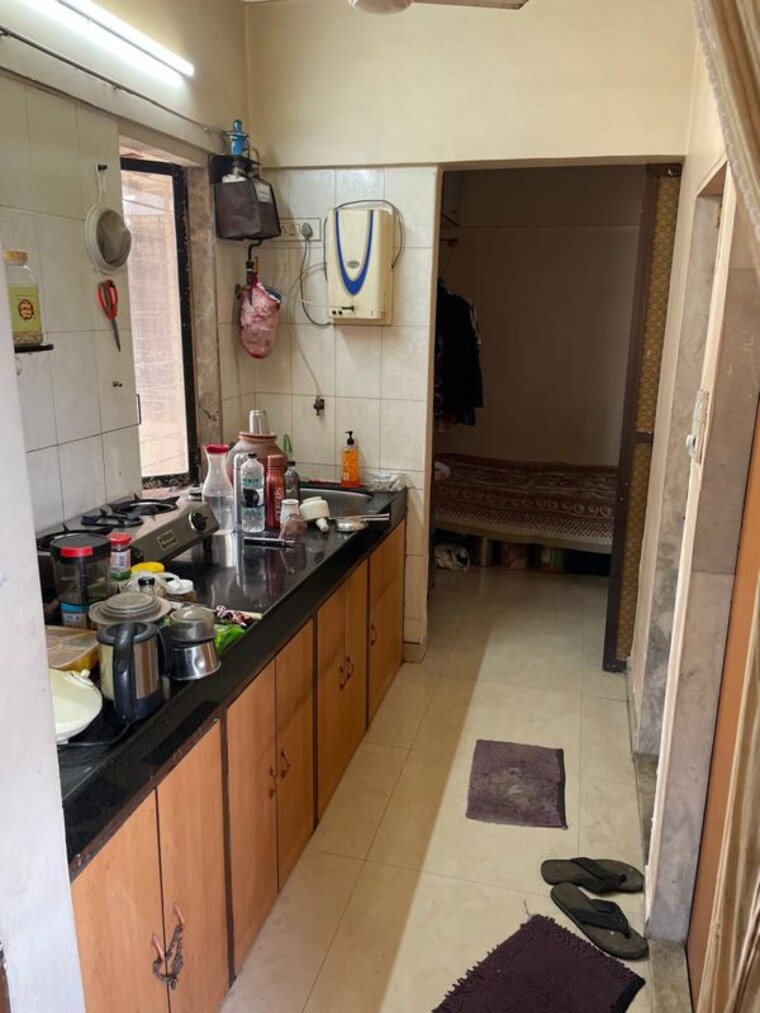 Kitchen, ajmera-bhakti-park 1 Bedroom 450 Sq.Ft. Apartment In Bhakti Park Mumbai 10396745
