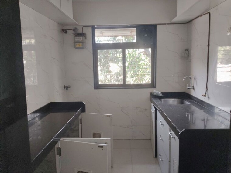 Kitchen, atharva-shweta-chs 2 Bedroom 600 Sq.Ft. Apartment In Chembur Mumbai 10396799