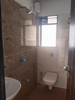 Bathroom in 2 BHK Apartment at Atharva Shweta CHS, Chembur – for Rent