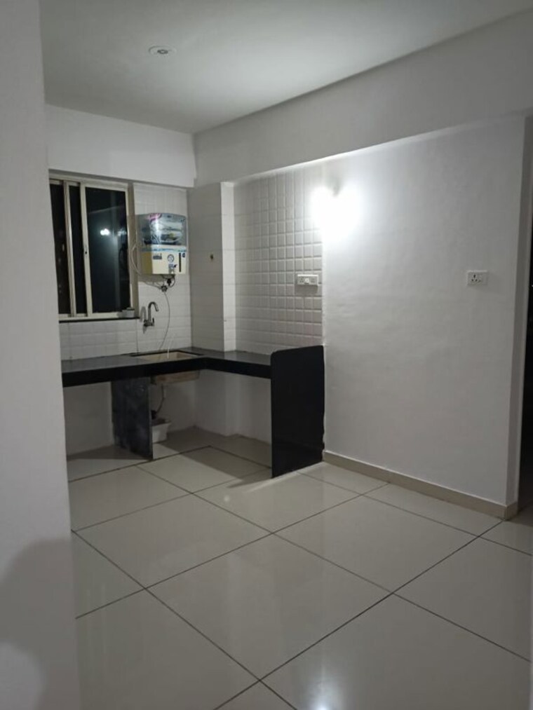 Kitchen, bunty-mayur-kilbil 1 Bedroom 550 Sq.Ft. Apartment In Dhanori Pune 10396882