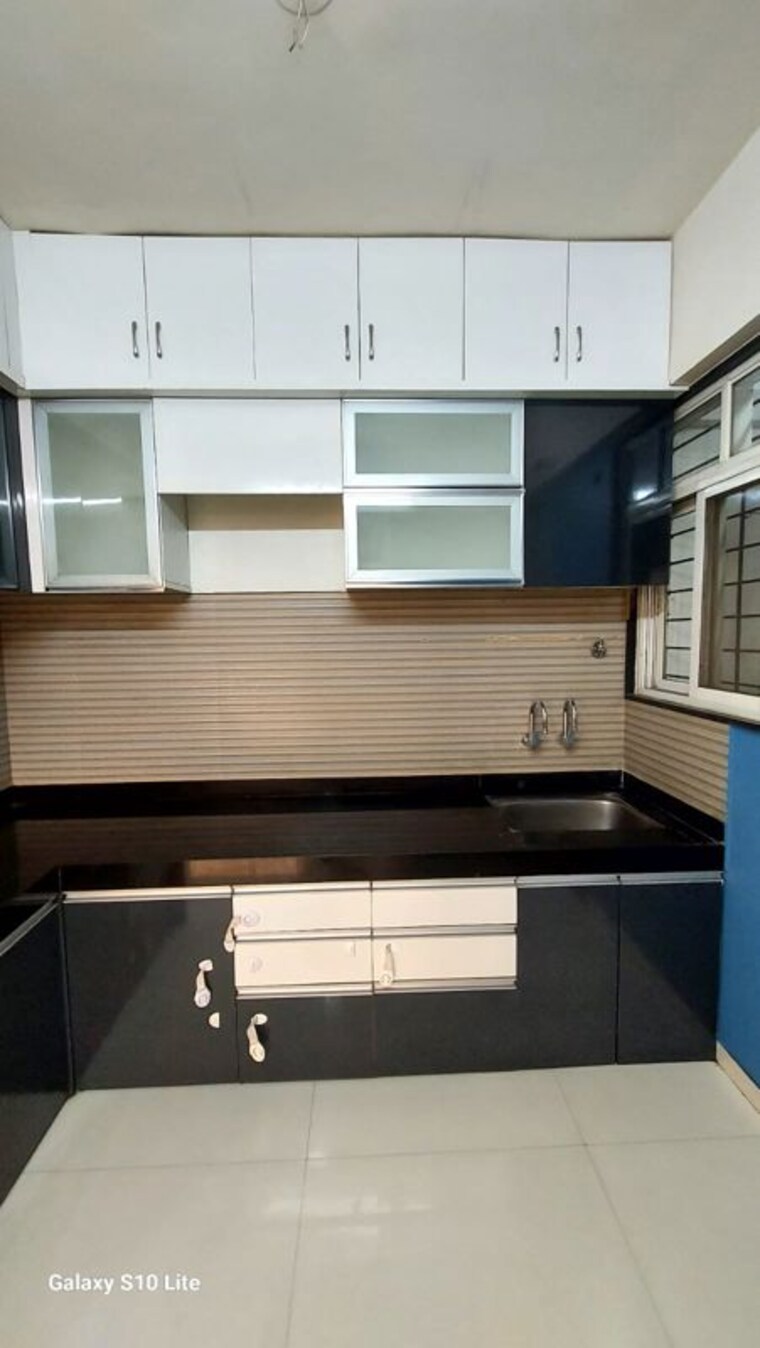 Kitchen, sai-pallacio 2 Bedroom 1200 Sq.Ft. Apartment In Ravet Pune 10396895