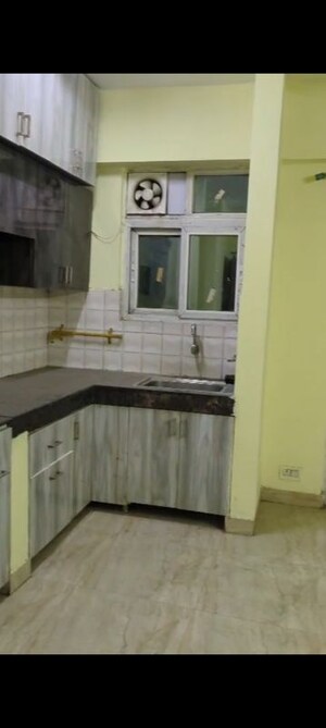 Kitchen in 2 BHK Apartment at Migsun Ultimo, Omicron Iii Greater Noida – for Rent