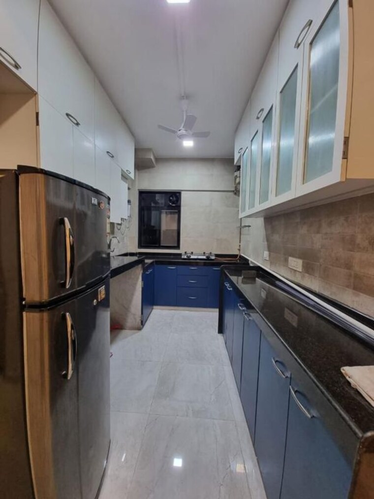 Kitchen, ekta-tripolis 2.5 Bedroom 900 Sq.Ft. Apartment In Goregaon West Mumbai 10396980