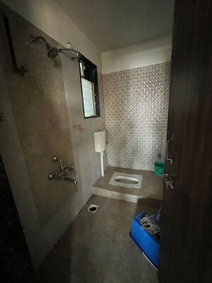 Bathroom in 2 BHK Apartment at Vijayalaxmi Laxmisatyam Residency, Dhanori – for Rent