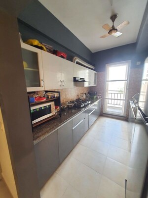 Kitchen in 3.5 BHK Apartment at Godrej Meridien, Sector 106 – for Sale
