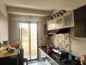 Kitchen in 1 BHK Apartment at Charms Paradise, Titwala – for Sale