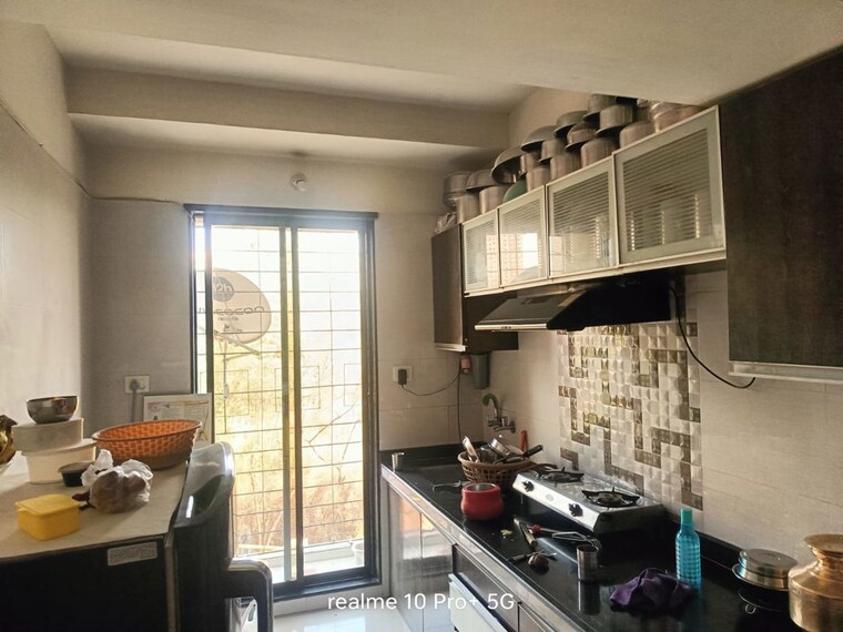 Kitchen, charms-paradise 1 Bedroom 450 Sq.Ft. Apartment In Titwala Thane 10397192