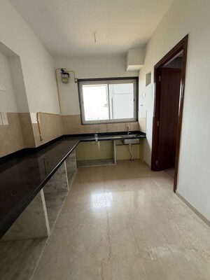 Kitchen in 3 BHK Apartment at Courtyard by Narang Realty and The Wadhwa Group, Pokhran Road No Two – for Sale