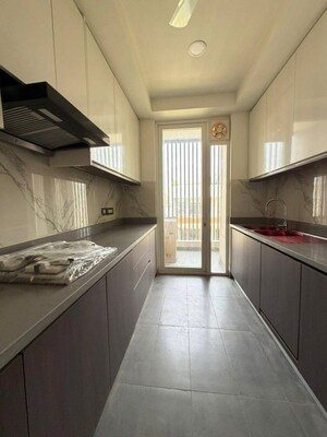 Kitchen in 3 BHK Apartment at DLF Exclusive Floors, Sector 53 – for Sale