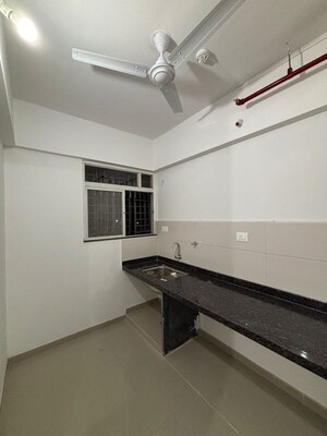 Kitchen in 1.5 BHK Apartment at RGS Forte, Wakad – for Rent