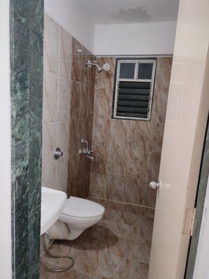 Bathroom in 2 BHK Apartment at Shroff Signature Heights, Wakad – for Rent