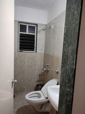 Bathroom in 2 BHK Apartment at Shroff Signature Heights, Wakad – for Rent