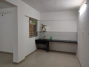 Kitchen in 2 BHK Apartment at Shroff Signature Heights, Wakad – for Rent