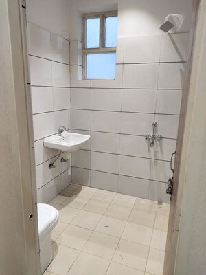 Bathroom in 2 BHK Builder Floor at Amolik Aster Woods, Sector 98 – for Sale