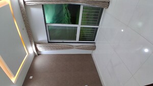 Bedroom in 2 BHK Apartment at Lotus Urban Hills, Shilphata – for Sale