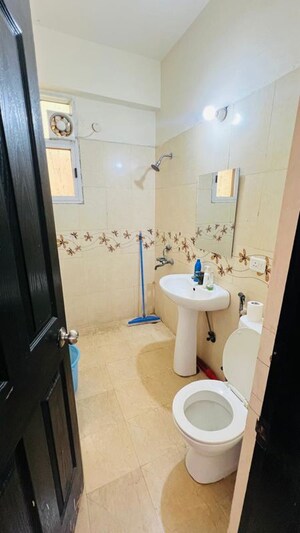 Bathroom in 2 BHK Apartment at Prateek Wisteria, Sector 77 – for Rent