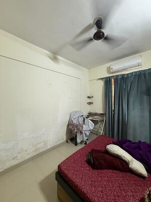 Bedroom in 2 BHK Apartment at LS Mehetre Laxmi Horizon, Punawale – for Rent