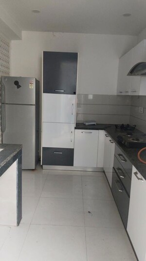 Kitchen in 3 BHK Apartment at Paradigm Business Hermitage Park, Dhakoli – for Rent