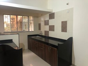 Kitchen in 2 BHK Apartment at G K Rajaveer Palace, Pimple Saudagar – for Rent