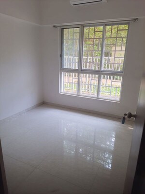 Living Room in 2 BHK Apartment at Lodha Amara, Kolshet Road – for Sale