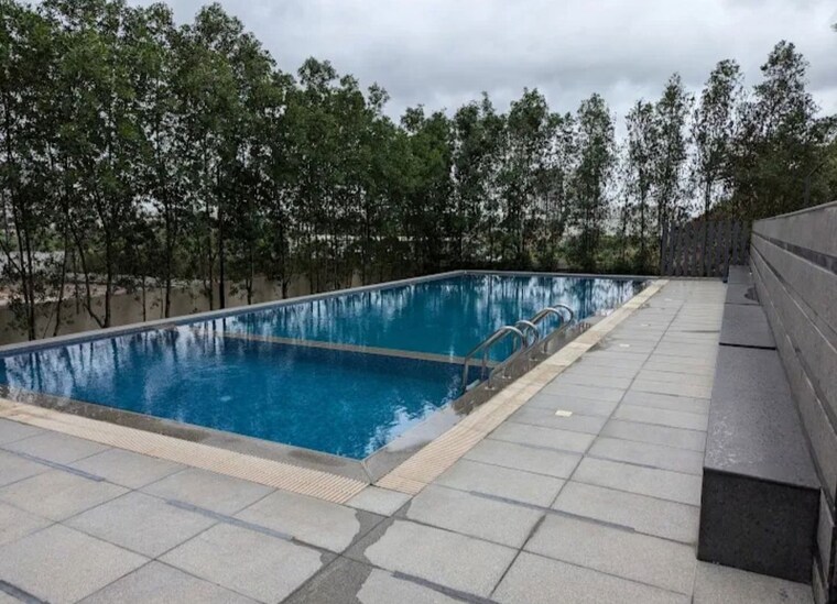Swimming Pool, amigo-united-avenues 3 Bedroom 1800 Sq.Ft. Apartment In Narsingi Hyderabad 10397584