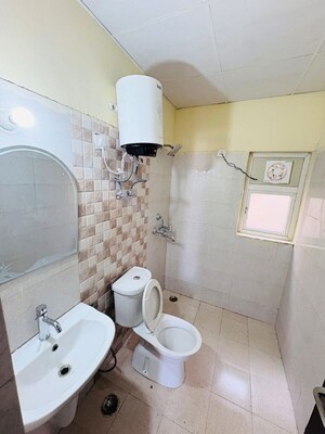 Bathroom in 3 BHK Apartment at Amrapali Silicon City, Sector 76 – for Rent