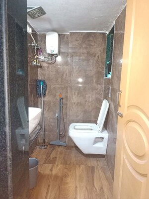 Bathroom in 1 BHK Apartment at Krishna Greenland Park Vastu Federation, Ghodbunder Road – for Rent