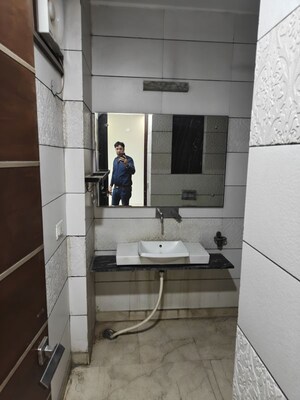 Washroom in 4 BHK Builder Floor at Model Town Phase 2 – for Rent