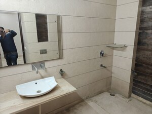 Bathroom in 4 BHK Builder Floor at Model Town Phase 2 – for Rent