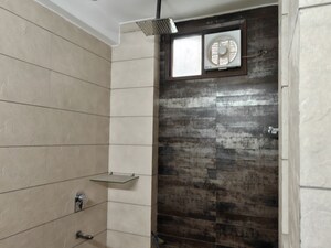 Bathroom in 4 BHK Builder Floor at Model Town Phase 2 – for Rent